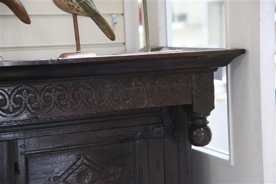 A 17th century oak court cupboard, W.5ft 8in. D.1ft 11in. H.5ft 1in.